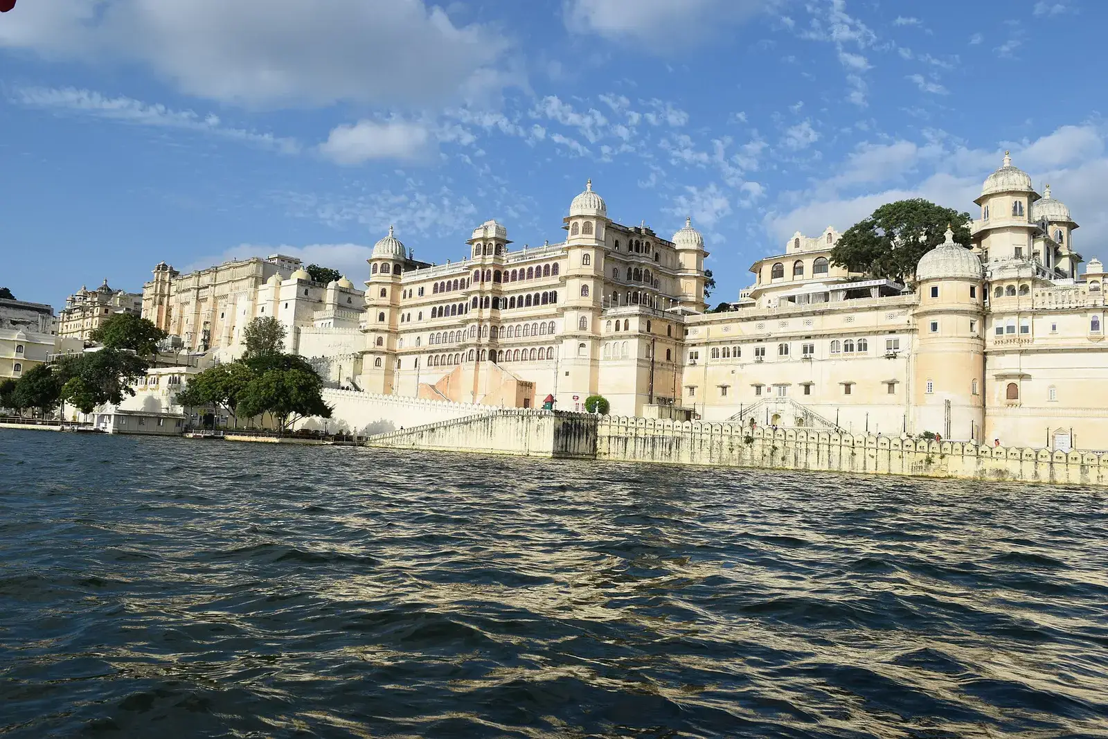 The City Palace in Udaipur seen from a boat on Lake Pichola